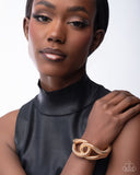 Interlocked Ignition - Gold- Paparazzi Accessories- Bracelet - Jewelry with Erin Binford