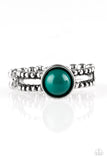 A refreshing green bead is pressed into the center of a dainty silver band radiating with studded detail for a seasonal look. Features a dainty stretchy band for a flexible fi
