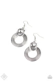 Grooved with antiqued shimmer, an abstract silver hoop attaches to a bent silver fitting for an artisan inspired look. Earring attaches to a standard fishhook fitting.