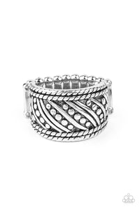 Studded and smooth silver bars delicately slant across the finger between two borders of silver rope-like texture, coalescing into an edgy band. Features a stretchy band for a flexible fit.