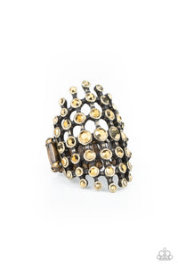 Featuring glistening brass fittings, a sparkly series of aurum rhinestones interlock into an edgy grid across the finger for a spellbinding look. Features a stretchy band for a flexible fit.  Sold as one individual ring.