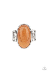 <p>An oval orange stone is encased inside a sleek silver frame, creating a mystical centerpiece atop the finger. Features a stretchy band for a flexible fit. As the stone elements in this piece are natural, some color variation is normal.</p> <p><i> Sold as one individual ring.</i></p>