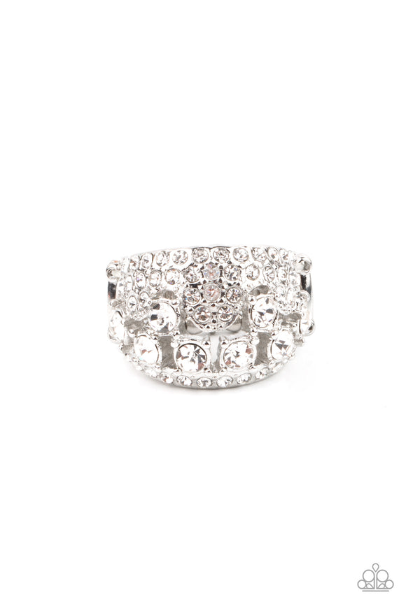 Encased in sleek silver fittings, a cluster of glittery white rhinestones coalesce inside an airy silver band encrusted in haphazard sections of glassy white rhinestones for a modern fashion. Features a stretchy band for a flexible fit.