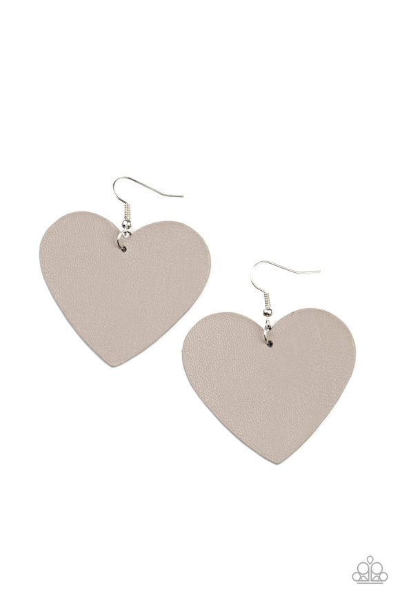 An Ultimate Gray leather heart frame swings from the ear for a flirtatiously neutral pop of color. Earring attaches to a standard fishhook fitting.