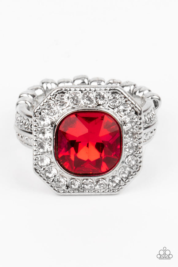 Bordered in a sparkly silver frame of glassy white rhinestones, an oversized red gem adorns the finger for a timeless finish. Features a dainty stretchy band for a flexible fit