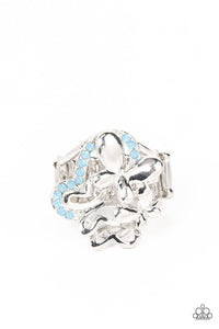 Enhanced with blue opal rhinestones, a shiny collection of mismatched silver butterfly frames flutters atop the finger, resulting in a whimsical bouquet. Features a stretchy band for a flexible fit.