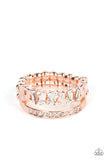 Infused with a timeless band of white rhinestones, a dainty collection of trapezoidal cut white rhinestones staggers across the finger for a glamorously layered look. Features a dainty stretchy band for a flexible fit.