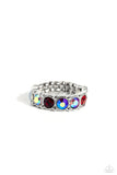 A glitzy collection of iridescent, red, and opal rhinestones encrusts the front of a studded silver band, result in a sparkly spectrum of color across the finger. Features a dainty stretchy band for a flexible fit.