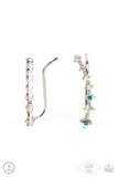 Gradually decreasing in size, a dainty row of glittery iridescent rhinestones curve up the ear for a stellar chic lo