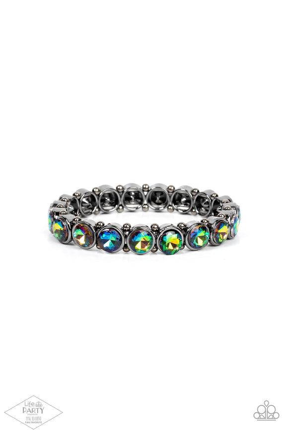 Infused with dainty gunmetal beads, glittery oil spill rhinestone encrusted frames are threaded along stretchy bands around the wrist for a glamorous look.