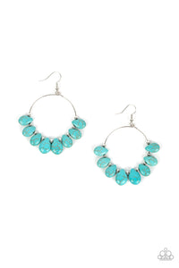 Imperfect turquoise teardrop stones alternate with dainty silver beads along a wire hoop, resulting in an adventurous fringe. Earring attaches to a standard fishhook fitting.