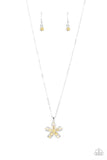 Emerald cut Daffodil rhinestones are scattered across the front of airy silver petals that bloom from a Daffodil rhinestone center, resulting in a sparkly floral pendant below the collar. Features an adjustable clasp c