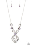 Twisted silver links and oversized purple rhinestones delicately alternate below the collar. A hammered filigree filled silver pendant shimmers from the bottom of the centermost rhinestone, creating a contemporary pendant. Features an adjustable clasp closure.