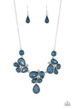 Draped elegantly across the chest, clusters of geometric blue gems, brushed in the fall Pantone® of Midnight, gather around sparkling white rhinestones, creating a bright and beautiful pattern. Features an adjustable clasp closure.