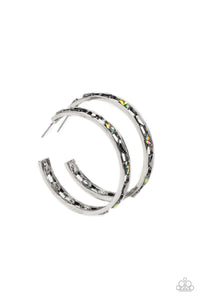 Dainty marquise-cut gems in hematite and oil spill finishes fall in line between two bars of silver, creating an airy hoop as they curl around the ear. Earring attaches to a standard post fitting. Hoop measures approximately 1.75" in diameter. Due to its prismatic palette, color may vary.