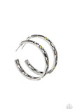 Dainty marquise-cut gems in hematite and oil spill finishes fall in line between two bars of silver, creating an airy hoop as they curl around the ear. Earring attaches to a standard post fitting. Hoop measures approximately 1.75" in diameter. Due to its prismatic palette, color may vary.