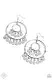 Silver discs, hammered with studded details, trickle from the bottom of an oversized sleek silver hoop, creating an elegant lure. A smaller hoop with a similar sheen, swings from the top of the oversized hoop, which features even more dangling discs for additional eye-catching movement. Earring attaches to a standard fishhook fitting.