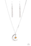 A glassy orange bead is pressed into the center of a three-dimensional silver star that dances from the top of a silver crescent moon pendant, creating a celestial pendant at the bottom of a dainty silver chain. Features an adjustable clasp closure.