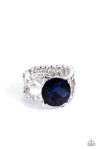 Glistening silver bars and white rhinestone-encrusted bands swirl across the finger, coalescing into an airy band. Featuring a regal faceted surface, a glittery blue gem is pressed into the center of the frame in silver-pronged fittings for a refined finish. Features a stretchy band for a flexible fit.