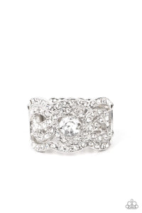 Wavy scalloped rows encased with rhinestones are topped by a central, sparkling rhinestone to provide an elegant and timeless look. Features a stretchy band for a flexible fit.  Sold as one individual ring.  Life of the Party - March 2022 Exclusive item