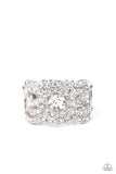 Wavy scalloped rows encased with rhinestones are topped by a central, sparkling rhinestone to provide an elegant and timeless look. Features a stretchy band for a flexible fit.  Sold as one individual ring.  Life of the Party - March 2022 Exclusive item
