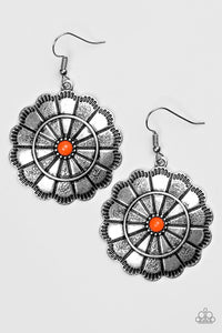 Shimmery silver petals bloom from a vivacious orange center for a seasonal look. Etched in serrated edges, alternating petals have been delicately hammered in texture, adding depth and shimmer to the whimsical frame. Earring attaches to a standard fishhook fitting.